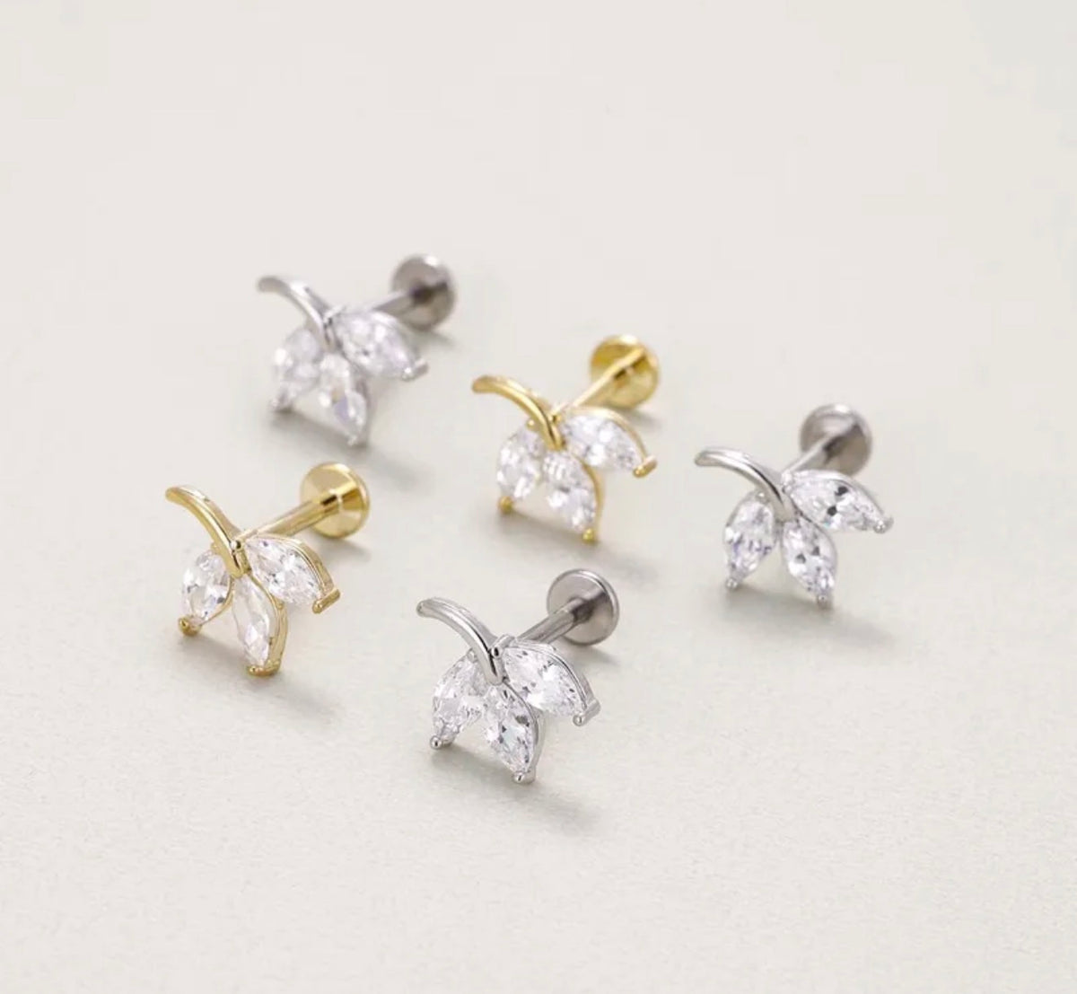 Premium gold and silver plated daily wear ad leaf nose pin product code E262
