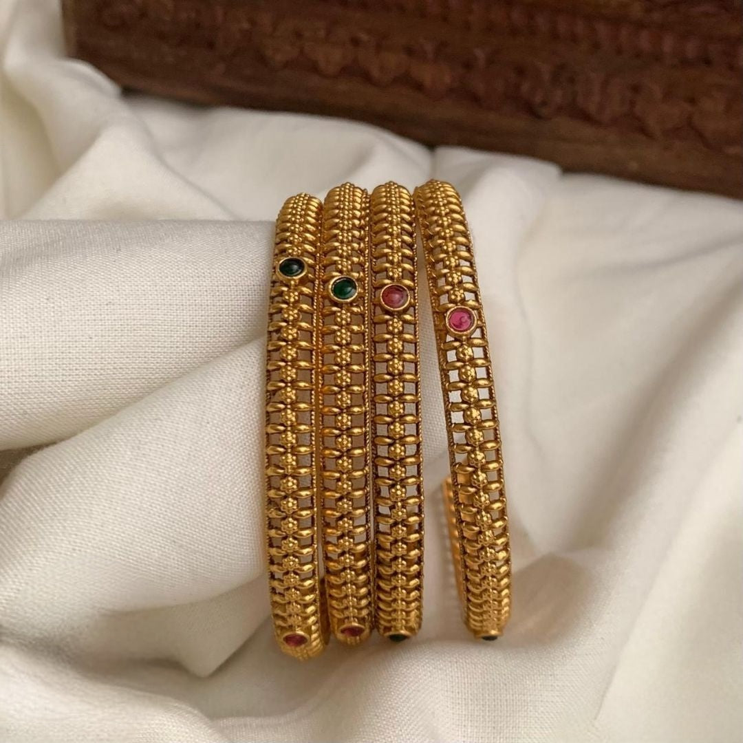 Premium antique gold-plated bangles feature traditional Kemp stones in green and ruby red color bangles set of 4 size 2.6