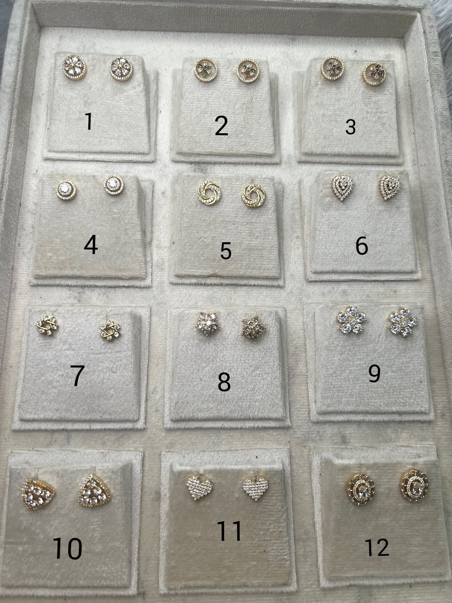 Gold replica ad studs product code E09