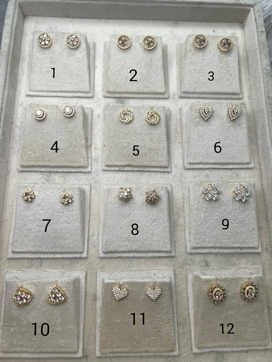 Gold replica ad studs product code E09