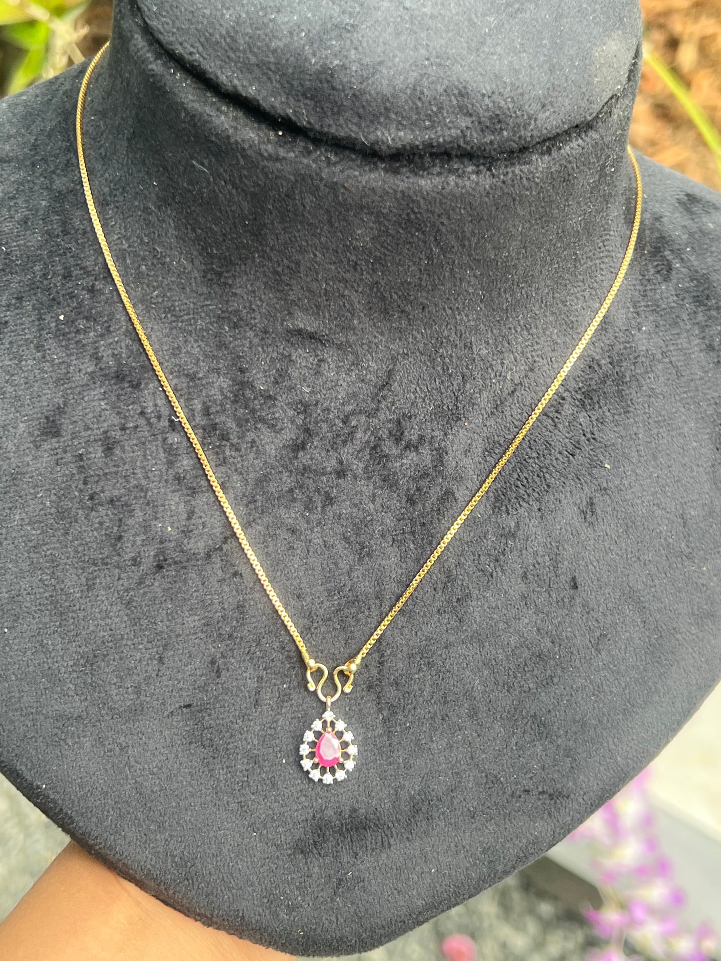Party wear diamond finish  very small ruby  pendant (not sweat proof )with gold plated chain product code D124