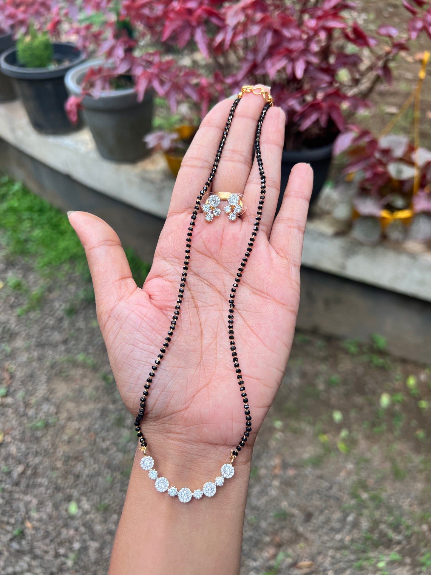 Premium diamond finish ad mangalsutra with matching stud product code 1245