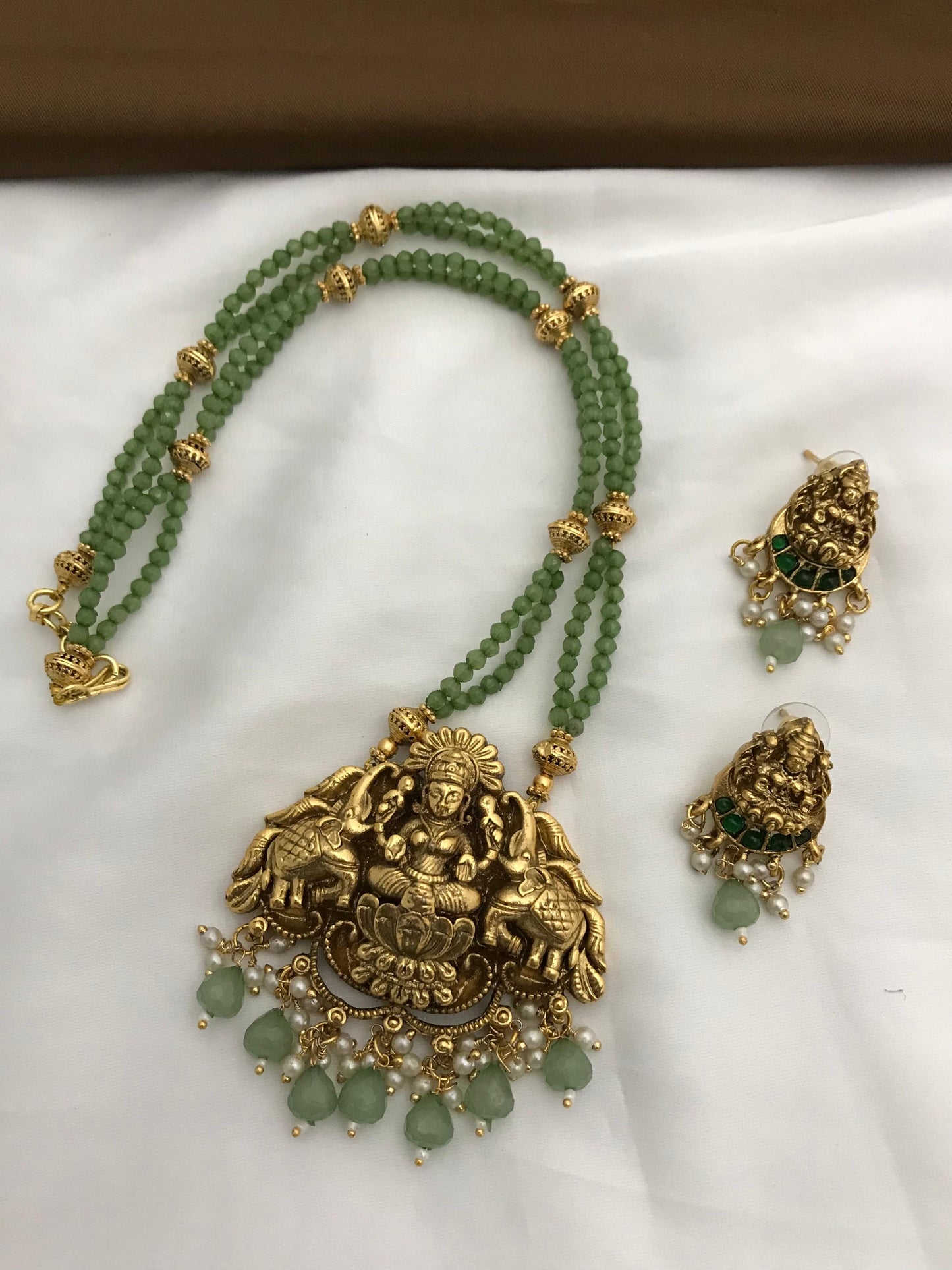 Trending lakshmi 2layer green beads chain with earrings