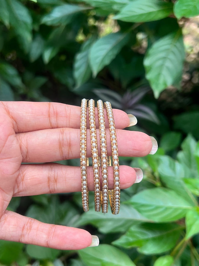 Premium antique gold pearl bangles (set of 4)
