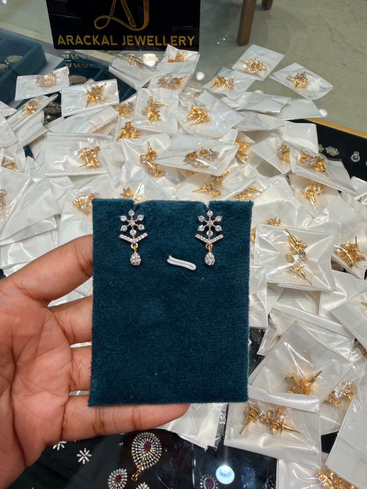 Premium diamond finish party wear earring product code E244