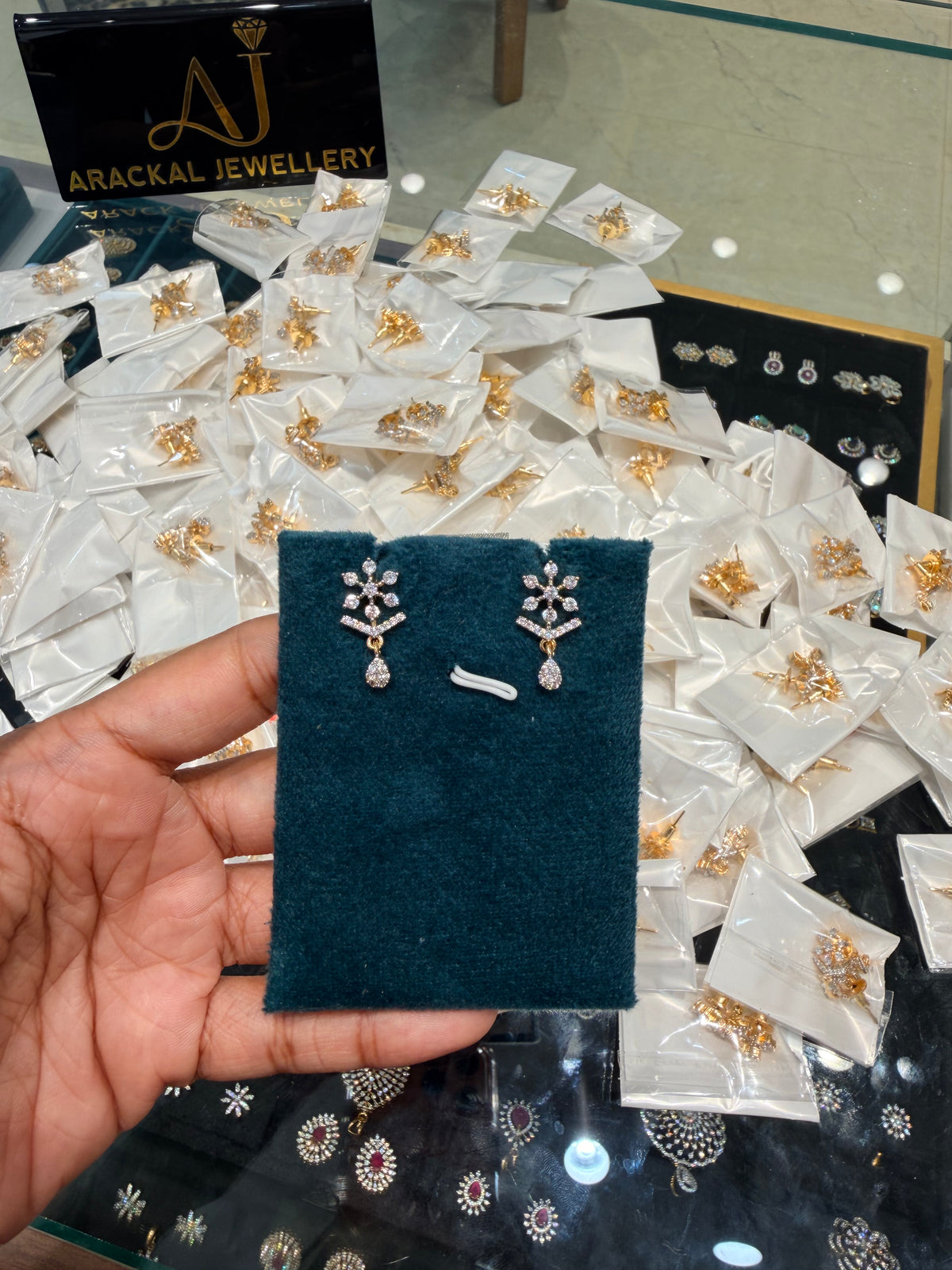 Premium diamond finish party wear earring product code E244