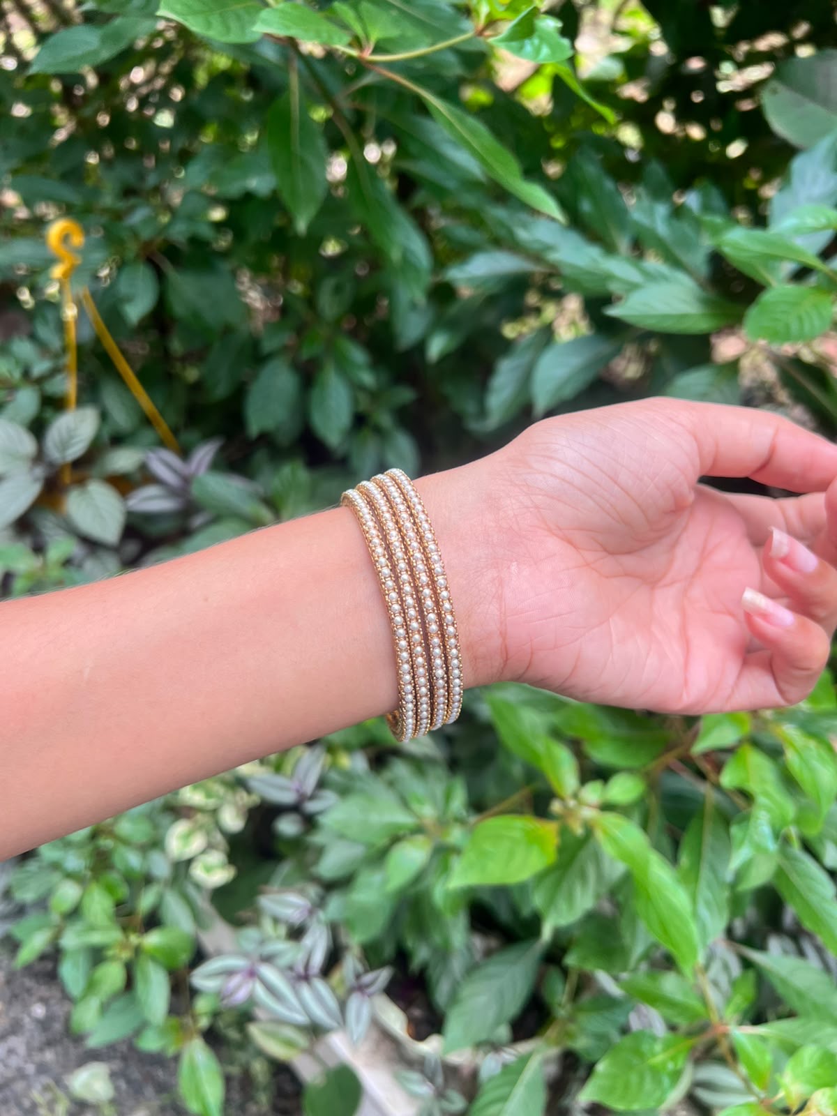 Premium antique gold pearl bangles (set of 4)