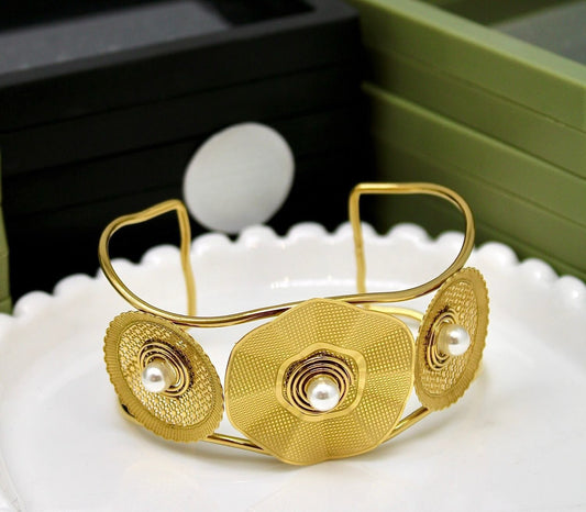 Gold plated stainless steel flower shaped cuff bracelet