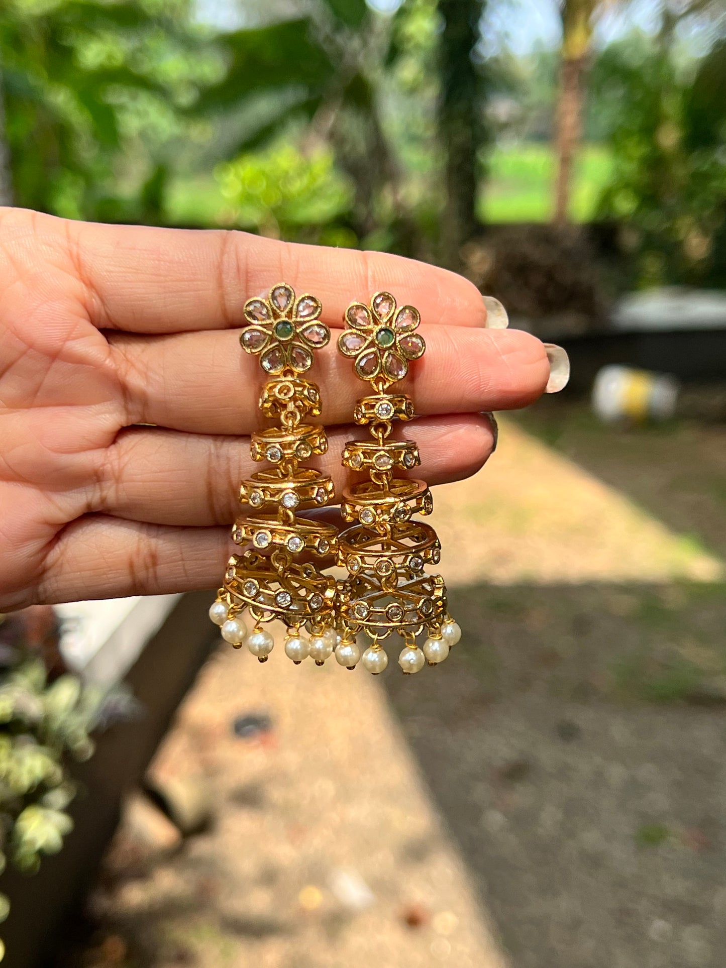 Premium ad dancing style spring jhumka product code E78