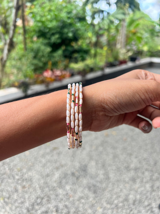 Trending Multi color pearl bangle set of 4 (2.4size )