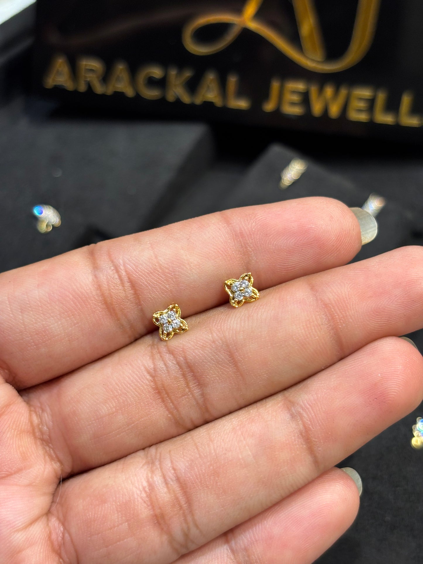 Premium gold plated daily ad stone second studs product code E67