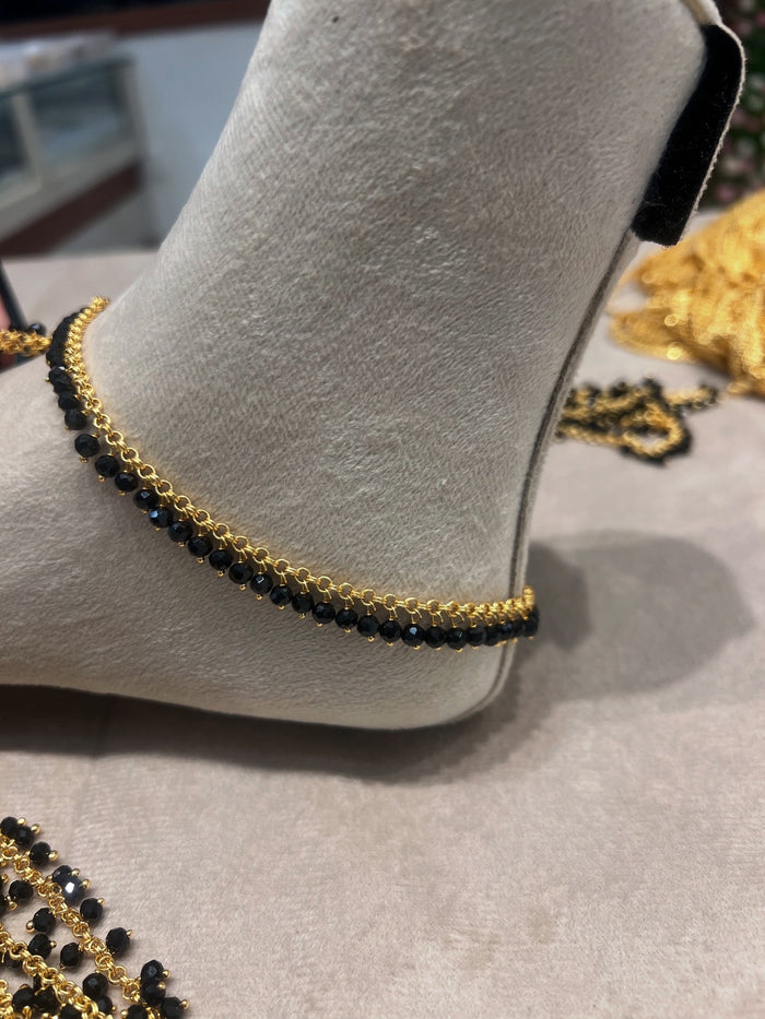 Premium gold plated black beads anklets product code A16