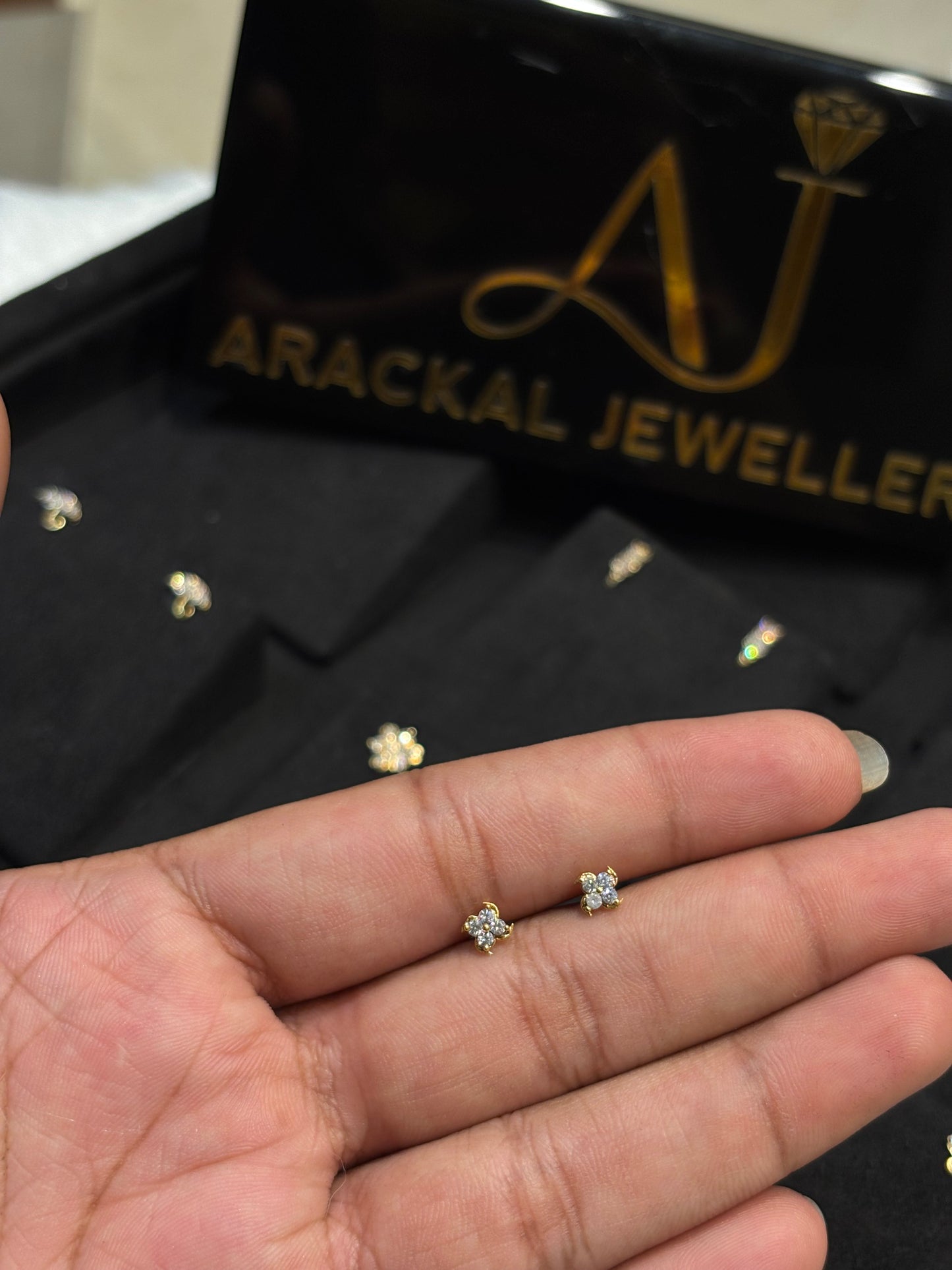 Premium gold plated daily ad stone second studs product code E67