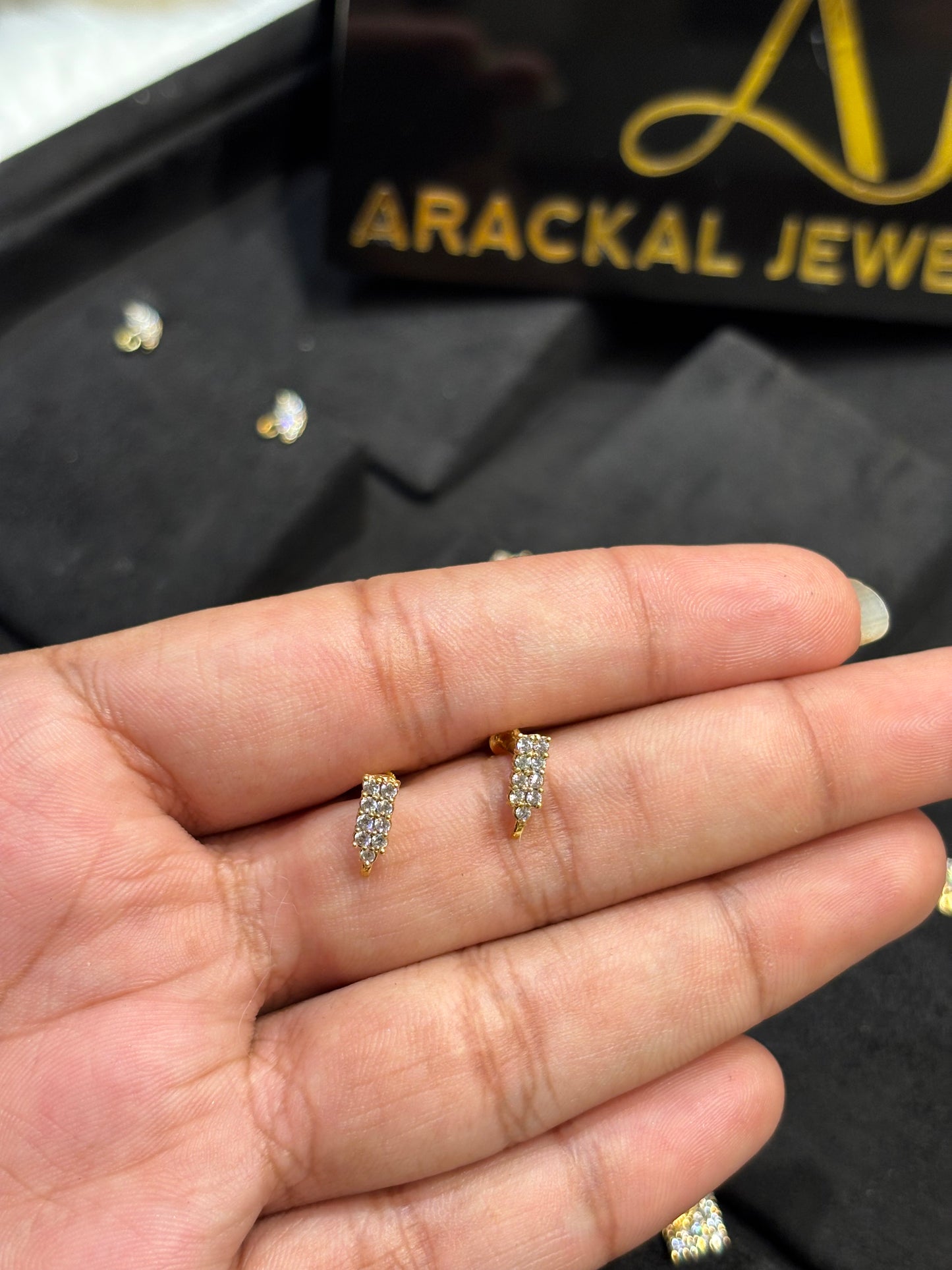 Premium gold plated daily ad stone second studs product code E67
