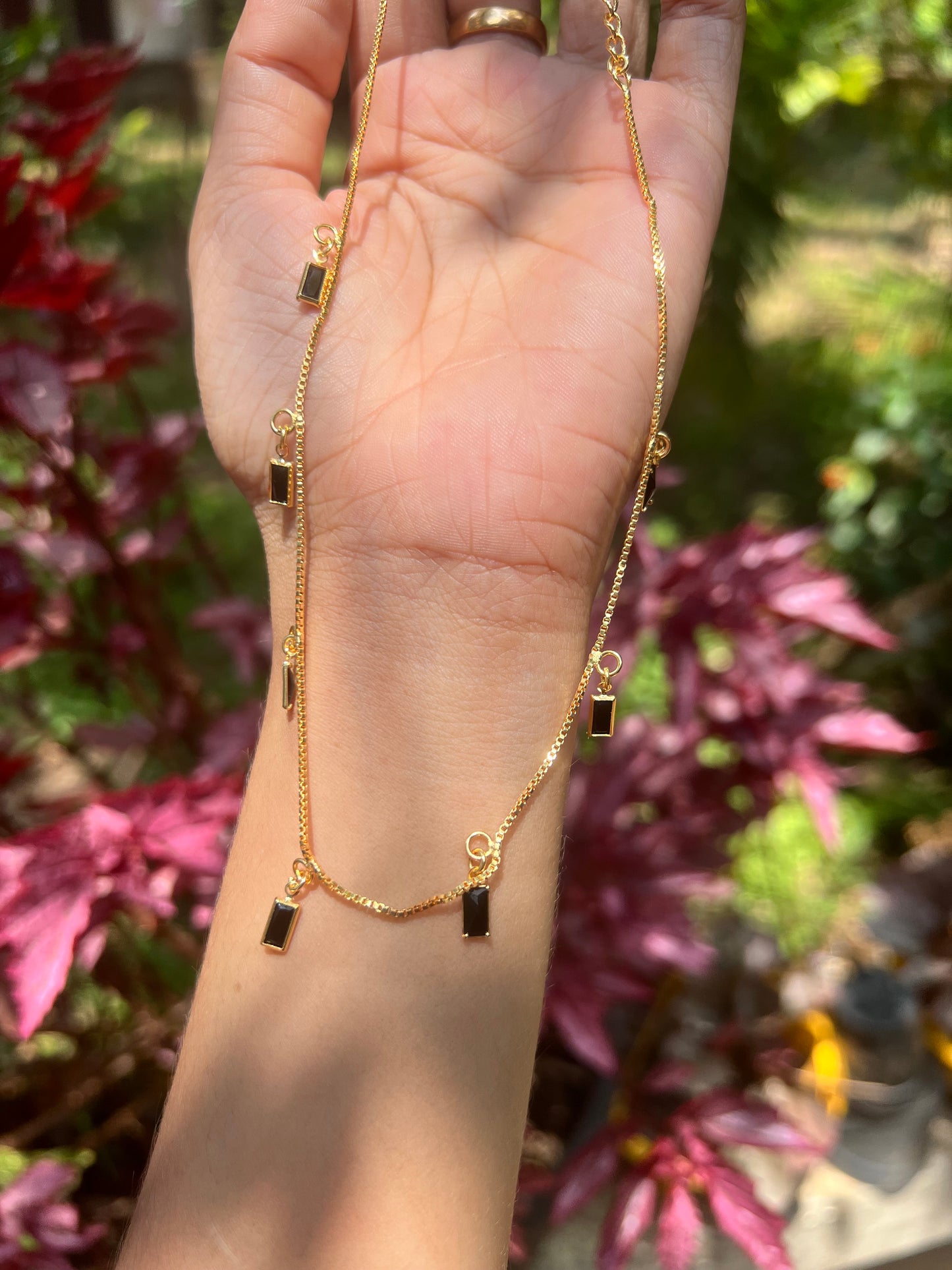 Gold plated trending stone drops necklace product code 1036