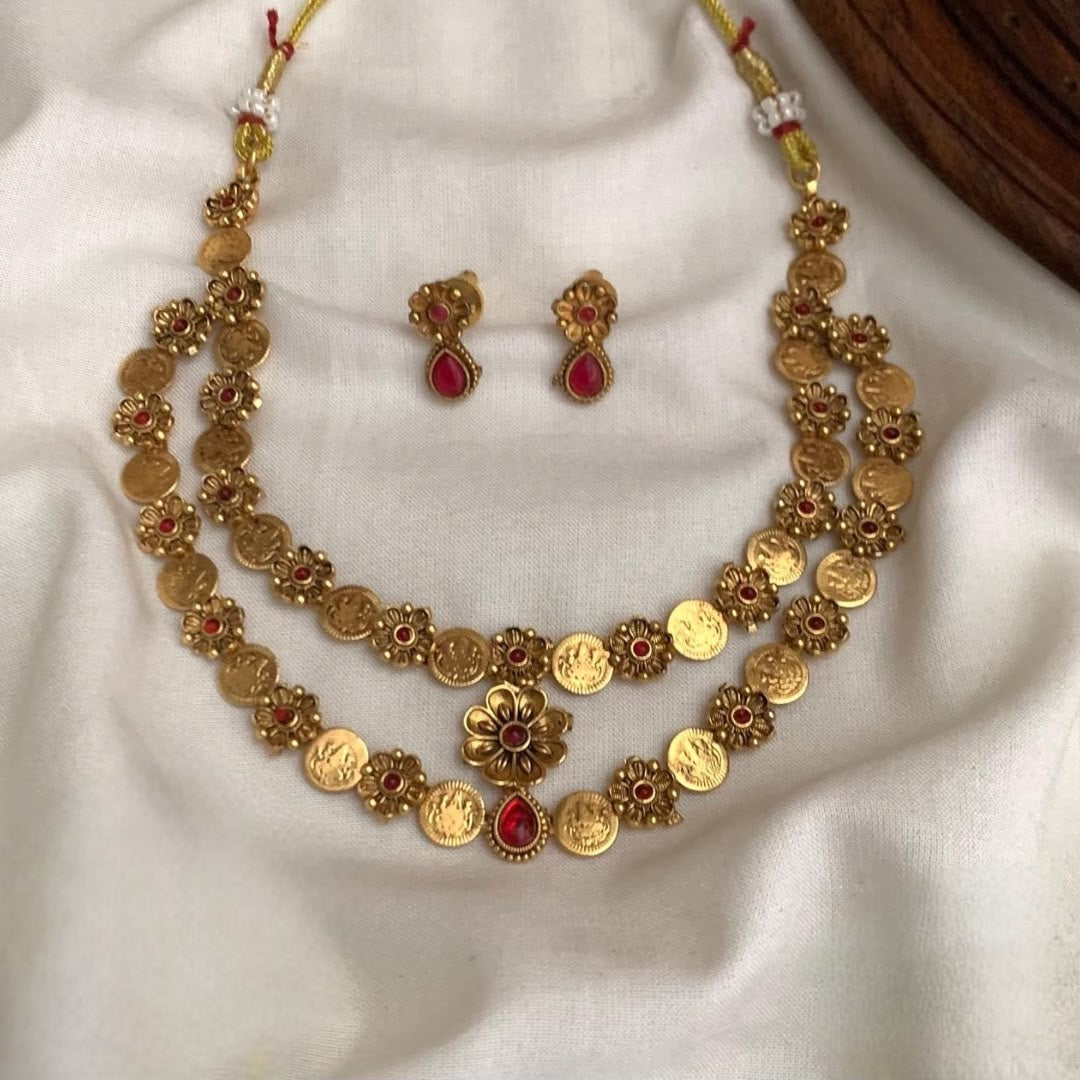Premium antique gold-plated Lakshmi coin/kasu 2layer necklace set features detailed goddess motifs accented with red/green stones product code T114