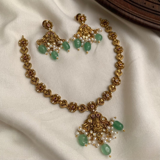 Premium antique gold traditional lakshmi devi floral necklace set product code T111