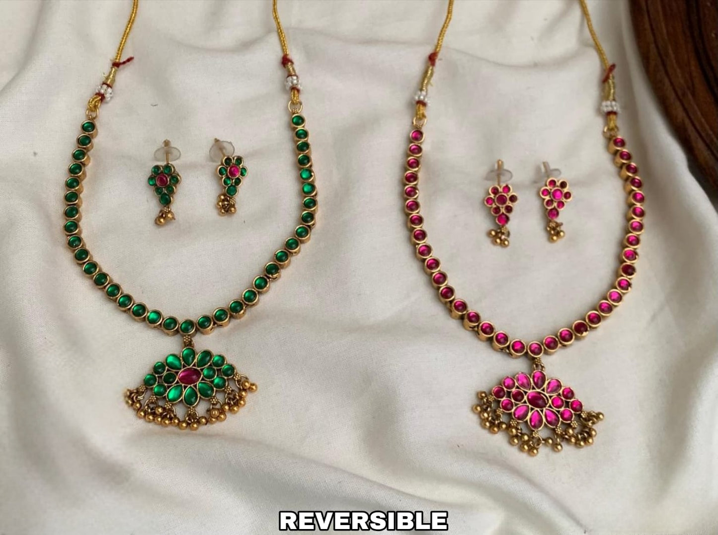 Premium reversible necklaces are traditional Attigai sets made with Kemp stones.They feature a dual-tone design, allowing you to switch between red and green stone sides product code T118