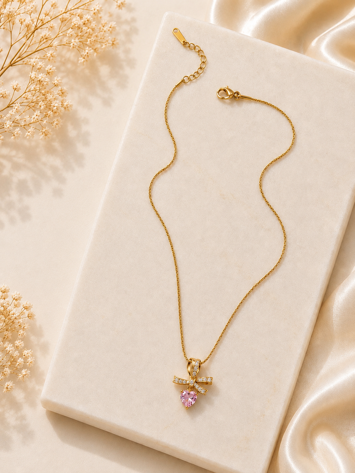 Premium anti tarnish pink crystal bow pendant with chain product code AT12