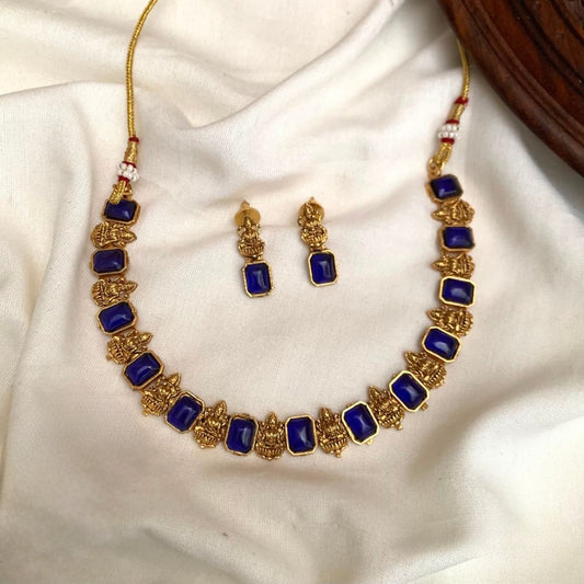 Premium traditional South Indian style with intricate temple-themed deities alternating with green gemstone necklace set product code T110