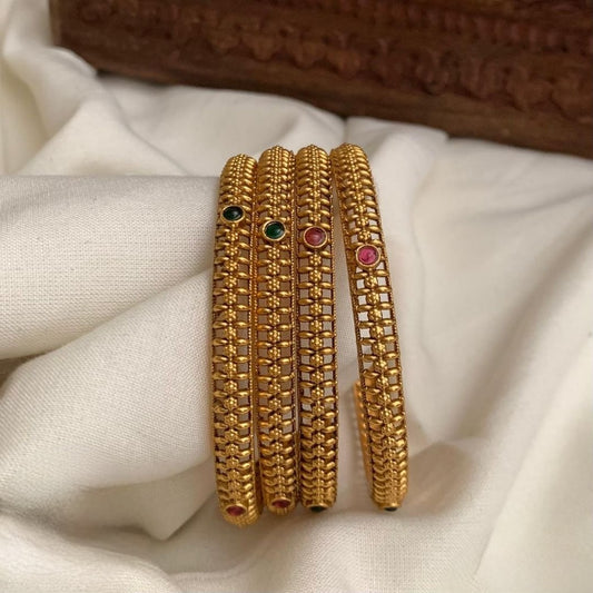 Premium antique gold-plated bangles feature traditional Kemp stones in green and ruby red color bangles set of 4 size 2.6