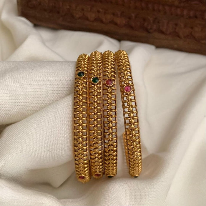 Premium antique gold-plated bangles feature traditional Kemp stones in green and ruby red color bangles set of 4 size 2.6